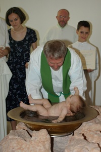 Battesimo celebrato da don Marco Bonfiglioli