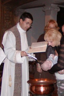 Battesimo celebrato da don Federico Badiali